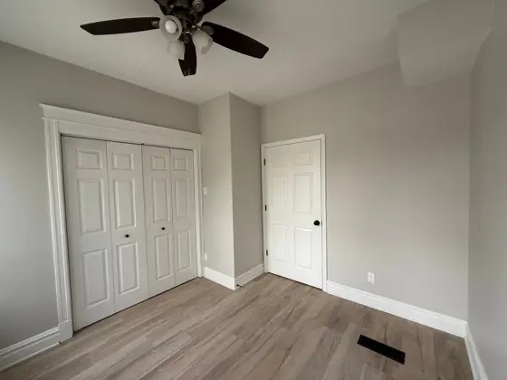 New LVP flooring with white closet doors